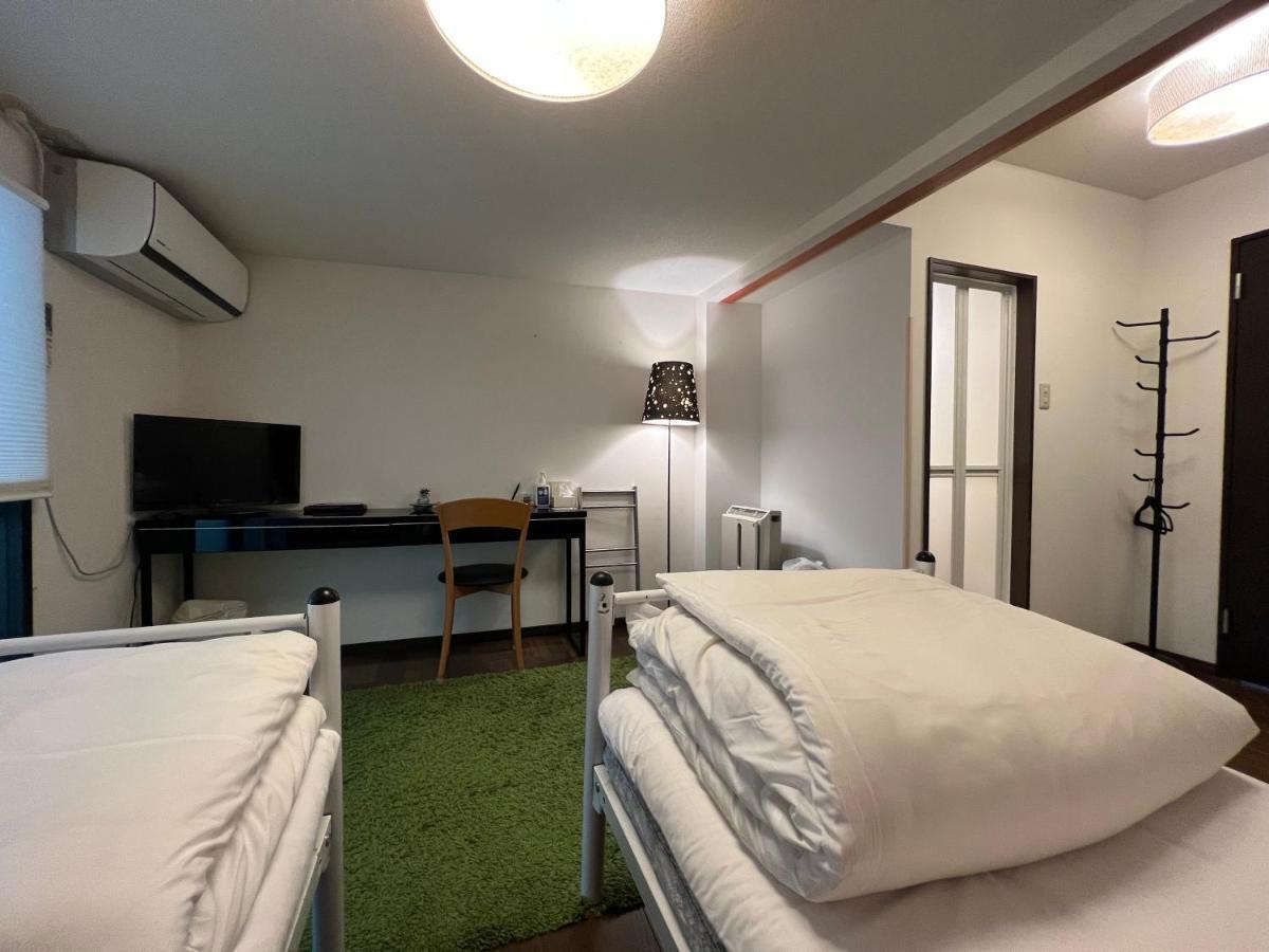 Bamboo Village Guest House Наосима Экстерьер фото