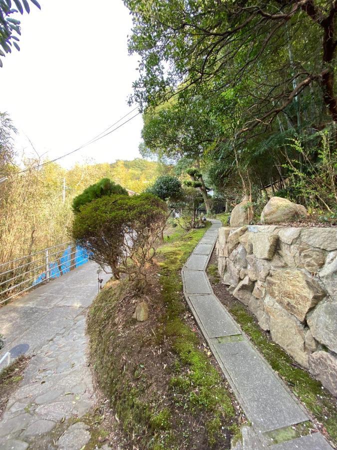 Bamboo Village Guest House Наосима Экстерьер фото