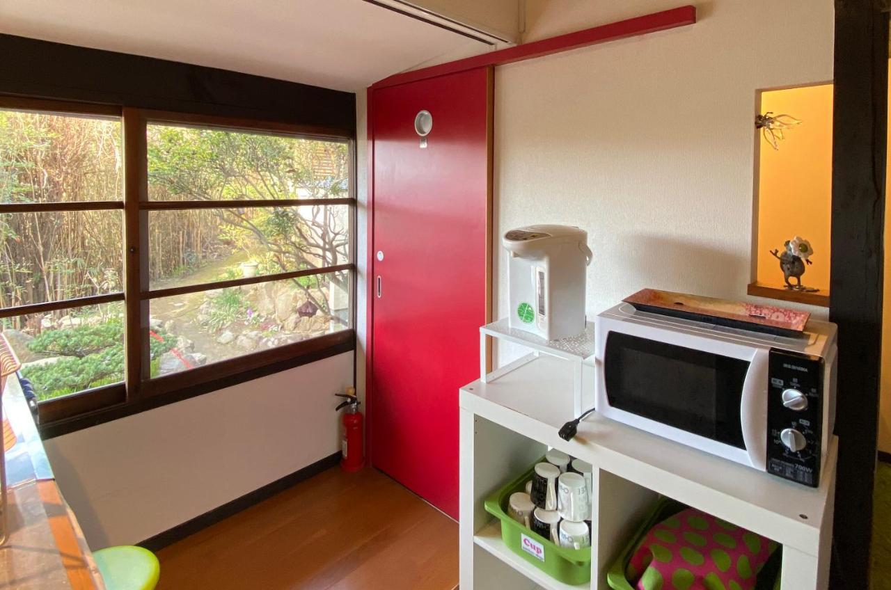 Bamboo Village Guest House Наосима Экстерьер фото